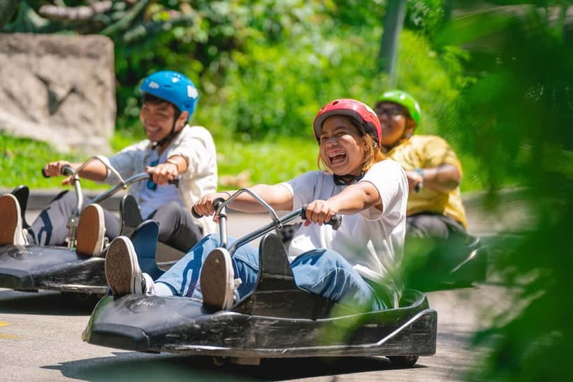 Singapore: Skyline Luge Sentosa Entry Ticket - What to pack: heat, swimwear, and helmet fit