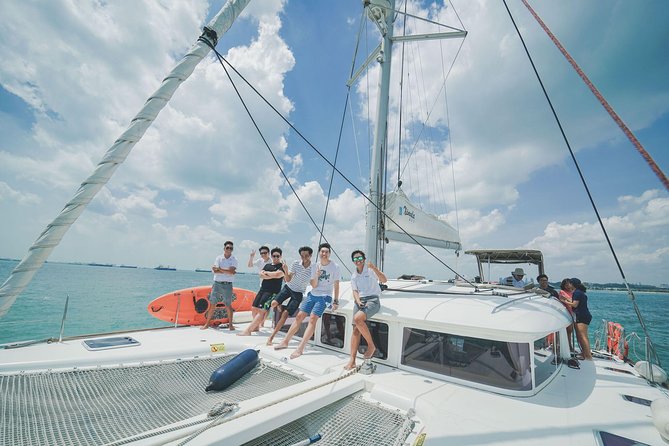 Singapore Sunset and Moring Cruise On A Luxury Catamaran - Getting to Sentosa Cove Village and boarding rules that actually matter